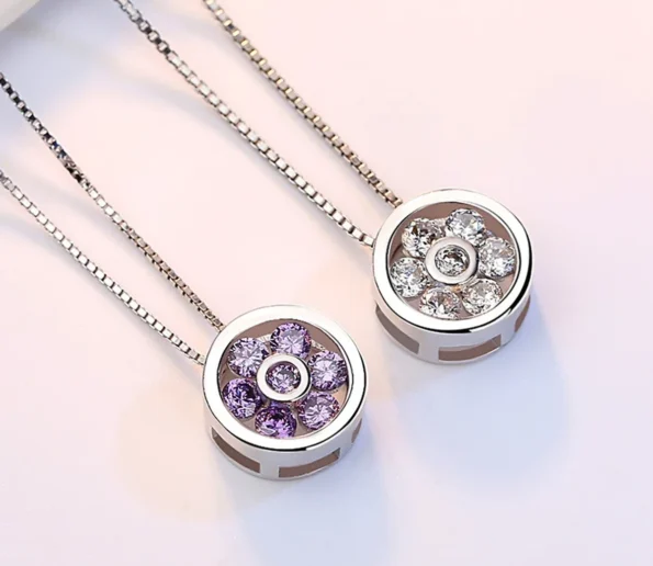 Elegant silver pendant necklaces with crystal flower designs