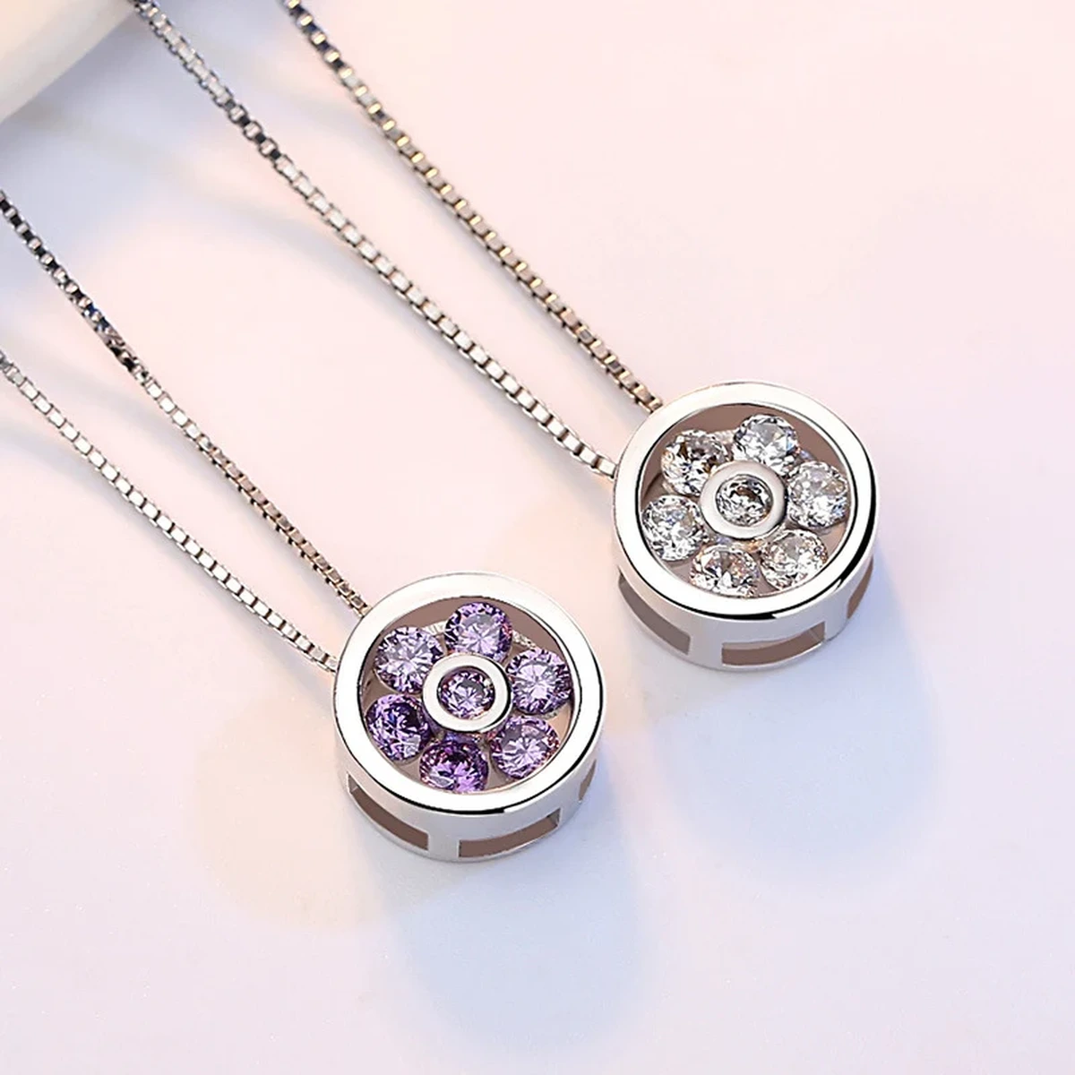 Elegant silver pendant necklaces with crystal flower designs