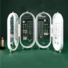 Elegant jewelry display case with assorted necklaces and earrings