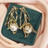 Gold pearl earrings