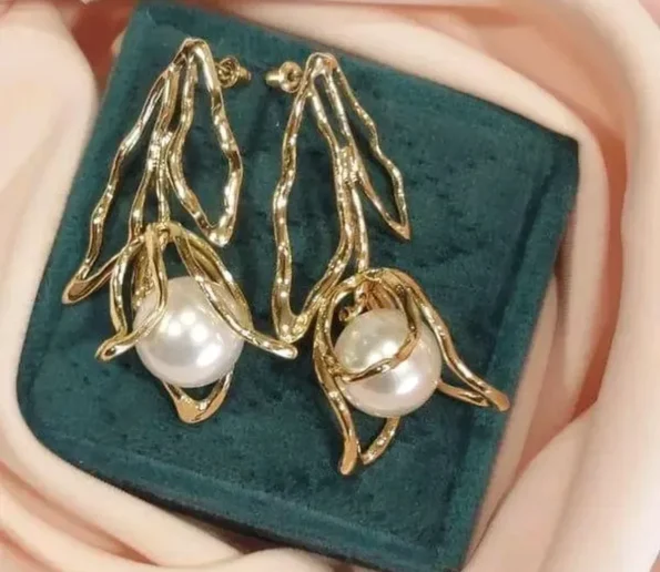 Gold pearl earrings