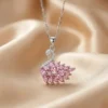 Elegant silver necklace with a sparkling pink swan pendant