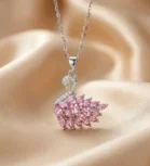 Elegant silver necklace with a sparkling pink swan pendant