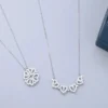 Elegant silver necklaces with heart and floral pendants