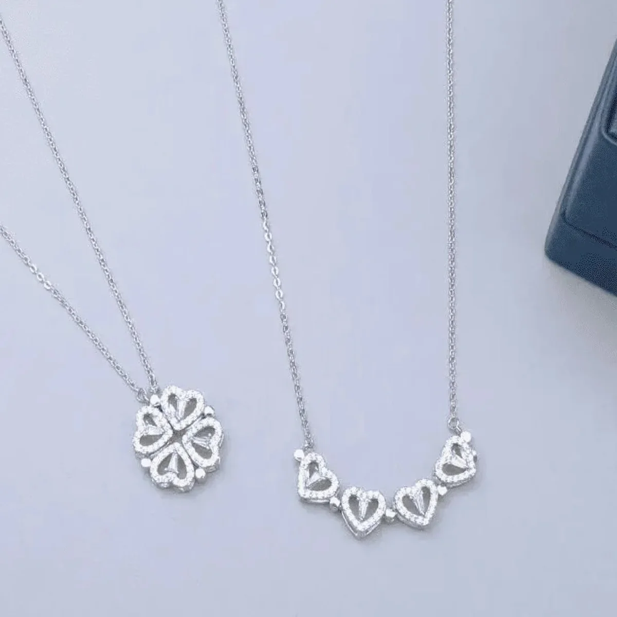 Elegant silver necklaces with heart and floral pendants