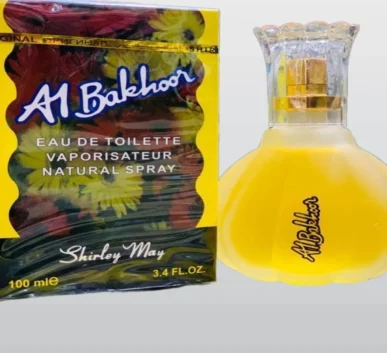 Al Bakhoor Shirley May yellow perfume bottle