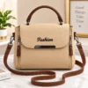 Beige and brown women’s handbag with a top handle