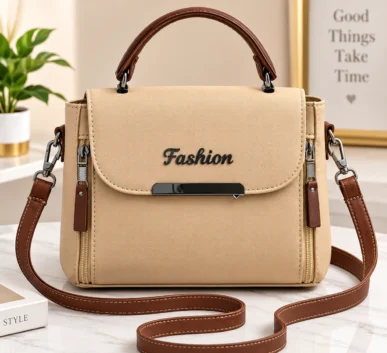 Beige and brown women’s handbag with a top handle