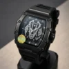 Black luxury skeleton watch with exposed gears, silver hands, and a modern rubber strap.