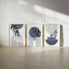 Minimalist abstract geometric wall art with arches, circles, and botanical leaves