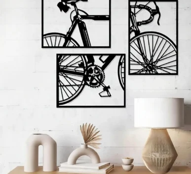 Black and white bicycle wall art set in a modern living room