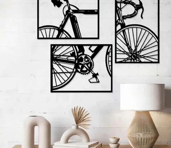 Black and white bicycle wall art set in a modern living room