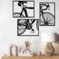 Black and white bicycle wall art set in a modern living room