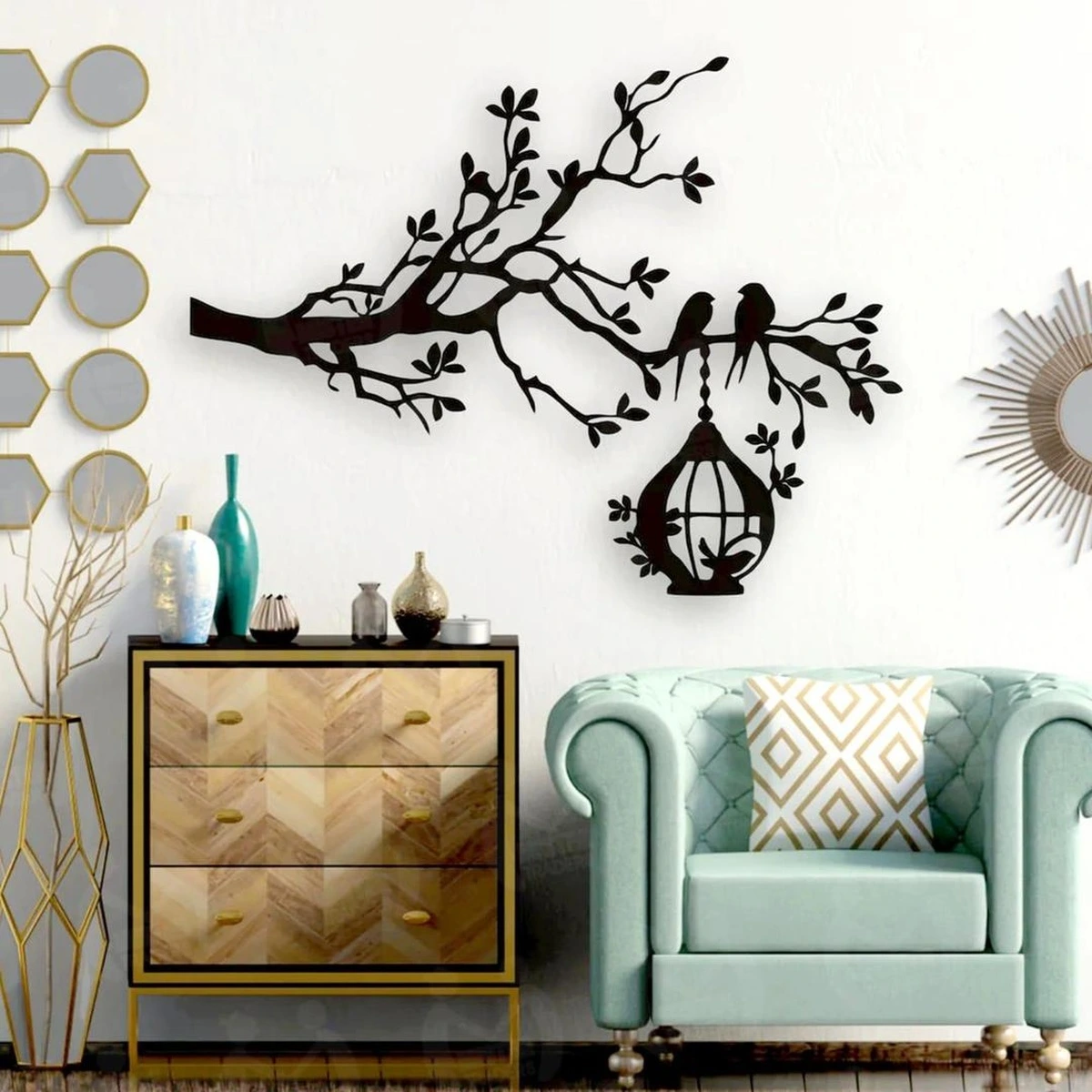Black tree branch wall decor with birds and hanging birdcage in a modern living room