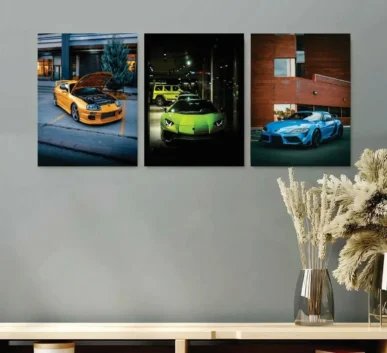 Luxury sports car wall art featuring three colorful cars in modern interior