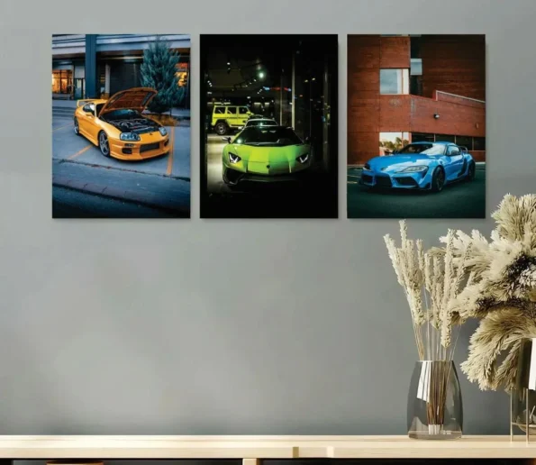 Luxury sports car wall art featuring three colorful cars in modern interior