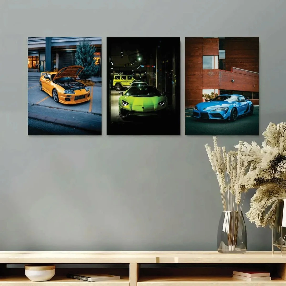 Luxury sports car wall art featuring three colorful cars in modern interior