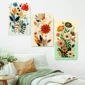 Colorful floral wall art panels with botanical flower illustrations in a modern bedroom