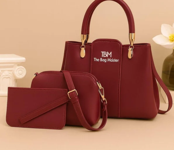 Maroon 3-piece handbag set featuring a handbag, crossbody bag, and matching wallet with gold-tone hardware.