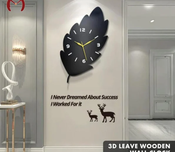 3D black leaf-shaped wooden wall clock with gold hands and modern decorative design.