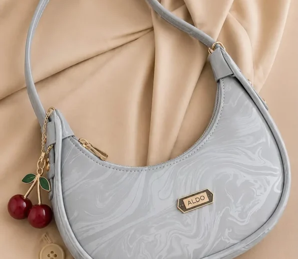 Light blue ALDO shoulder bag with cherry charm