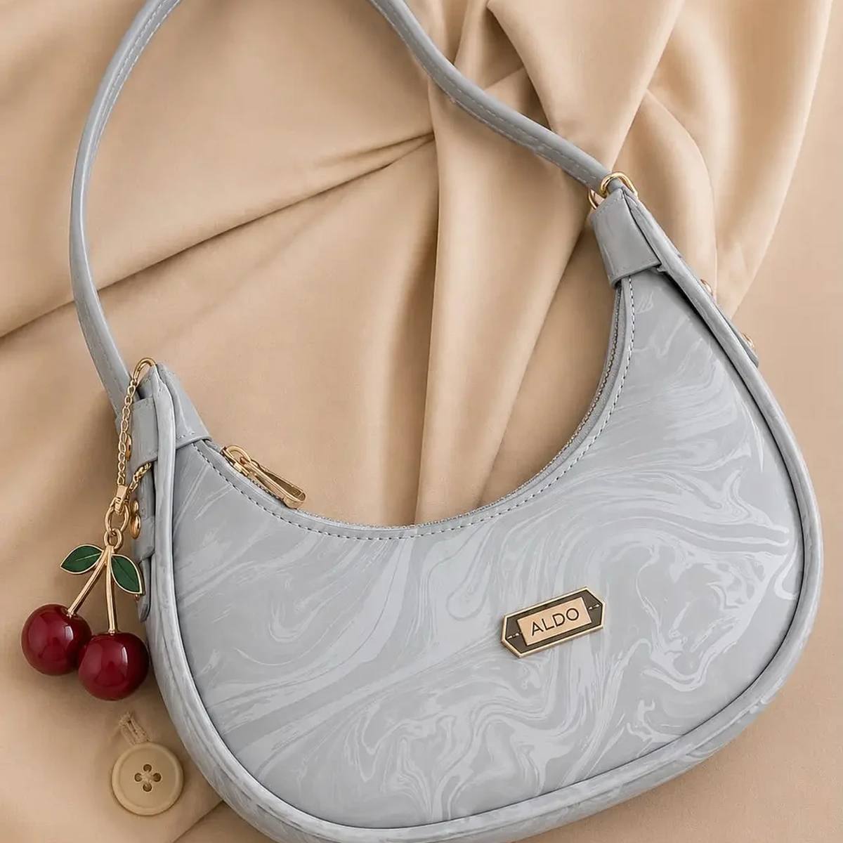 Light blue ALDO shoulder bag with cherry charm