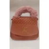 Pink quilted handbag with fluffy faux fur handle and gold-tone LV logo
