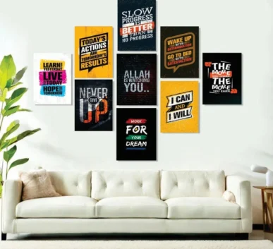 Motivational wall art posters with inspirational quotes displayed above a modern sofa