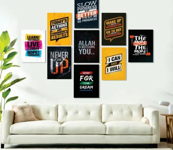Motivational wall art posters with inspirational quotes displayed above a modern sofa