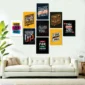 Motivational wall art posters with inspirational quotes displayed above a modern sofa
