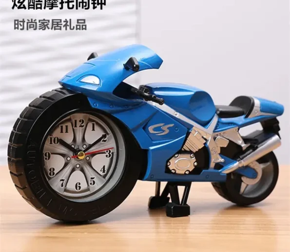 Blue motorcycle-shaped table clock with a detailed analog dial and sporty decorative design.