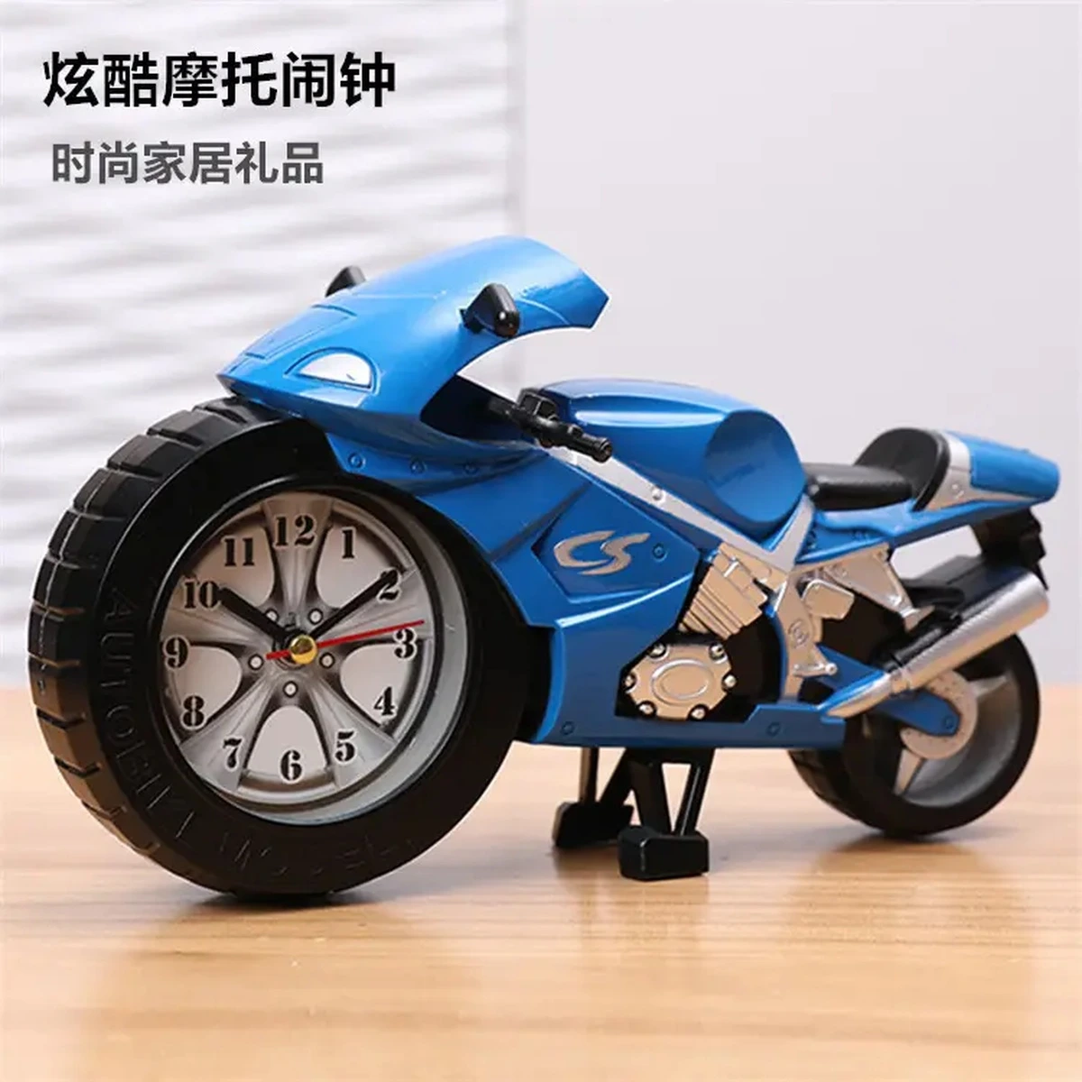 Blue motorcycle-shaped table clock with a detailed analog dial and sporty decorative design.