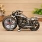 Silver motorcycle-shaped table clock with a detailed analog dial and chrome finish.