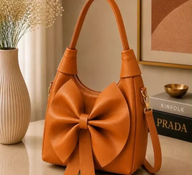 Orange bow shoulder bag for women