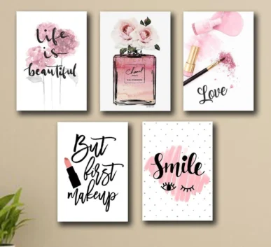 Pink beauty wall art featuring perfume, makeup, roses, and inspirational quotes
