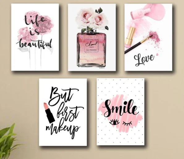 Pink beauty wall art featuring perfume, makeup, roses, and inspirational quotes