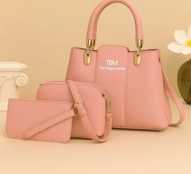 Pink women’s handbag set with shoulder bag and wallet