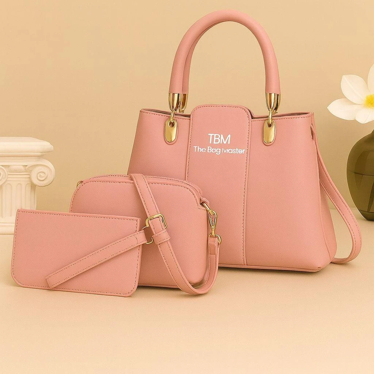Pink women’s handbag set with shoulder bag and wallet