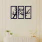 Three-panel black tree branch wall art in a modern living room
