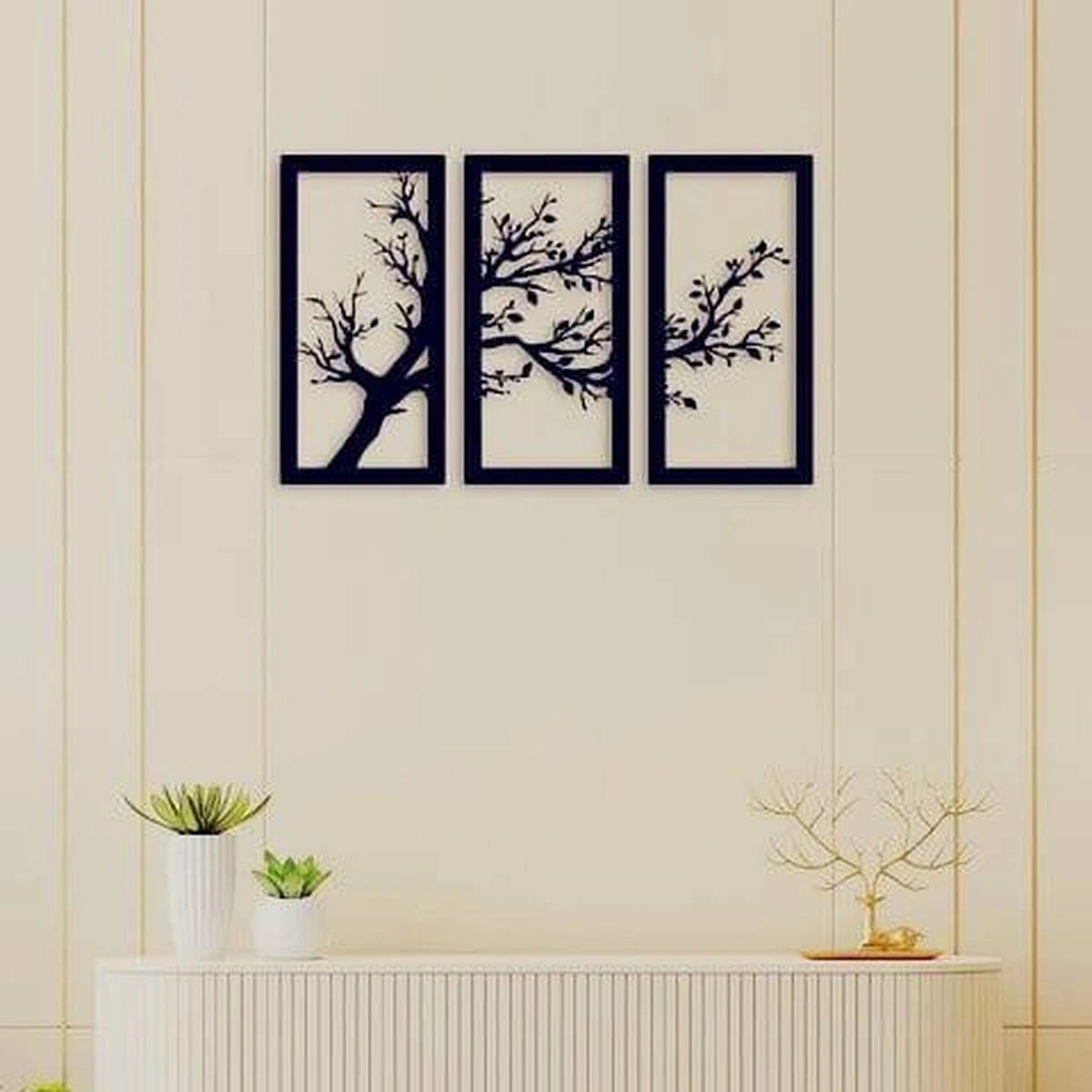 Three-panel black tree branch wall art in a modern living room